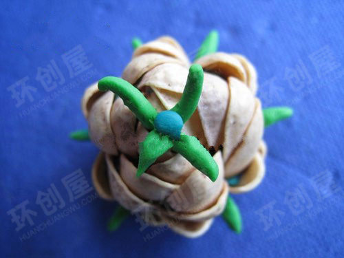 幼儿园春天环境布置图片：开心果壳花朵7