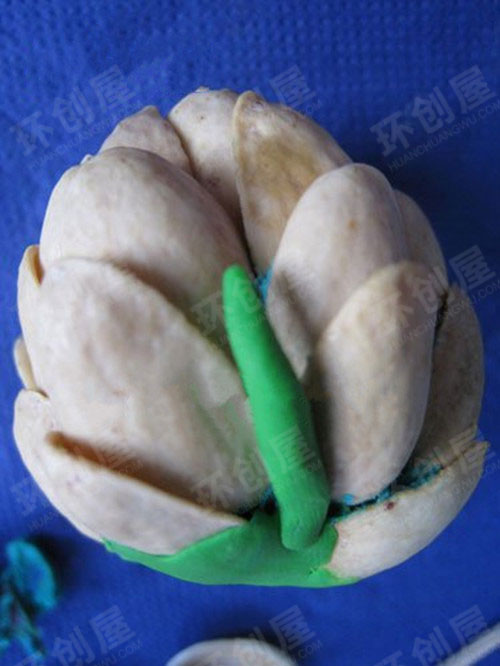 幼儿园春天环境布置图片：开心果壳花朵6