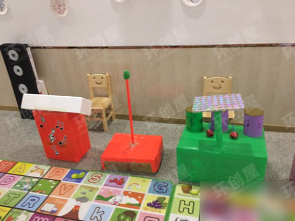 幼儿园表演区废物利用自制音乐玩教具图片