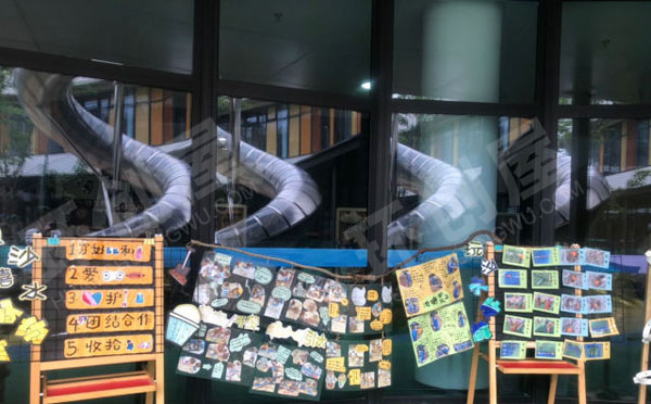 幼儿园沙水区户外环创图片