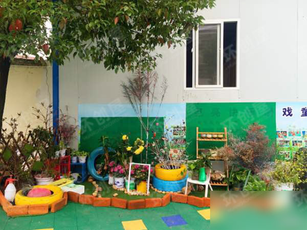 幼儿园户外轮胎造型植物角环创图片