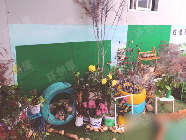 幼儿园户外轮胎造型植物角环创图片