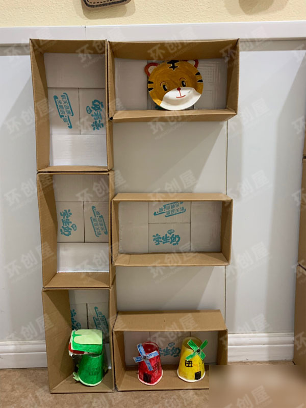 幼儿园作品展示环创牛奶盒的利用图片