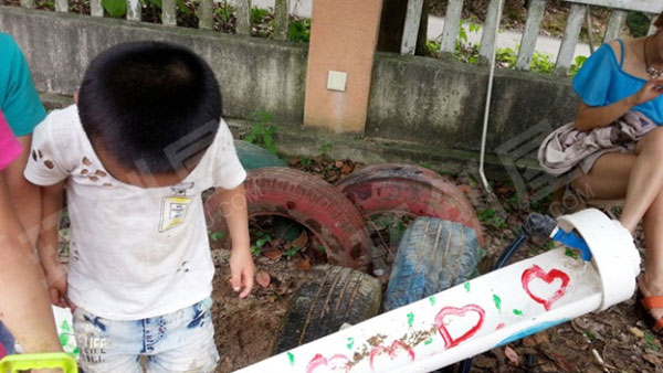 幼儿园户外环创沙地游戏图片