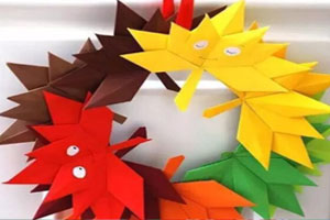 幼儿园门窗挂饰创意折纸花环图片3张