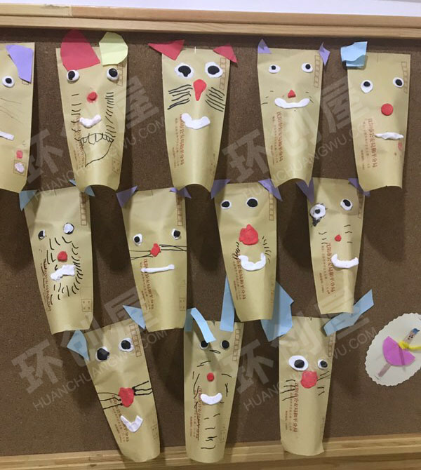 幼儿园墙面布置各种各样的木偶图片