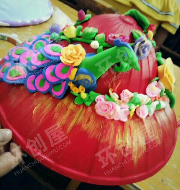 幼儿园角色区帽子孔雀图片