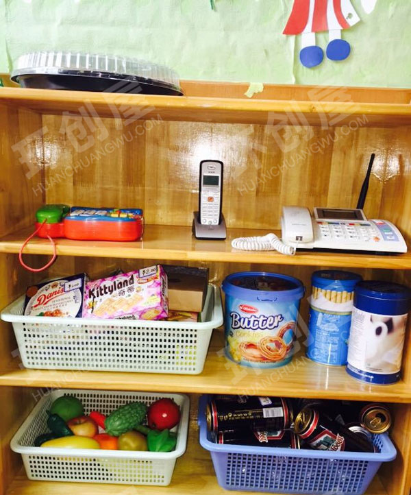 幼儿园角色区小超市货架物品摆放图片