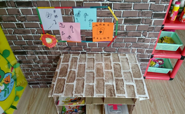 幼儿园废物利用图书角布置图片