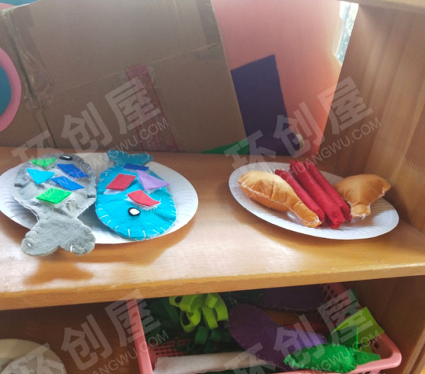 幼儿园角色区可以操作的娃娃家图片