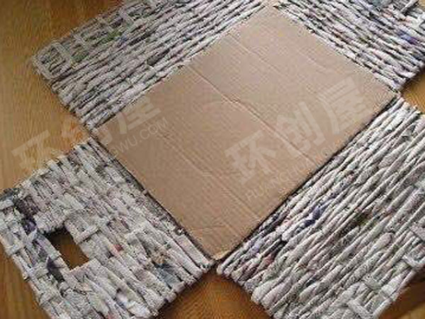 幼儿园美工区报纸做出漂亮的编织品图片