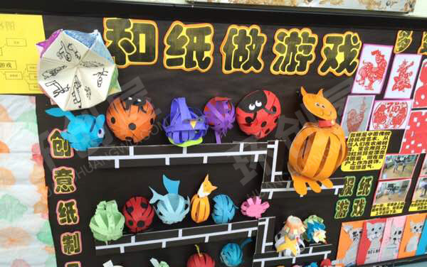 幼儿园主题墙和纸做游戏图片