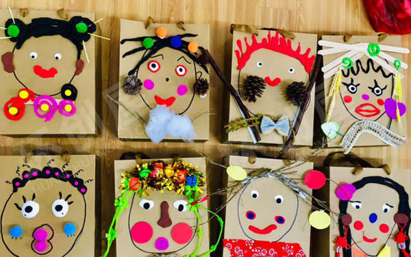 幼儿园户外环墙面纸盒纸袋粘土手工制品图片
