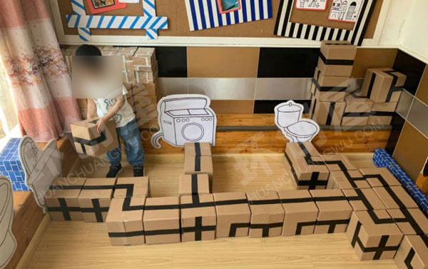 幼儿园建构区废物利用纸盒搭建图片