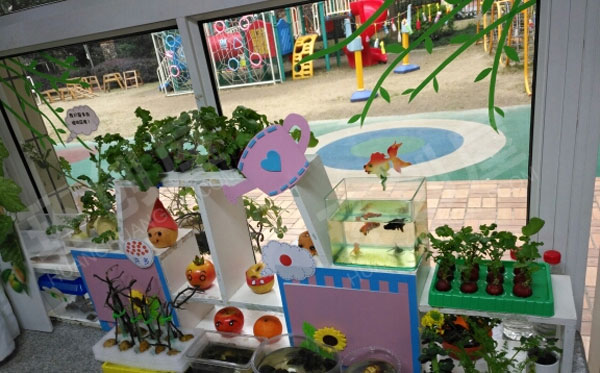 幼儿园户外春日自然角环创图片