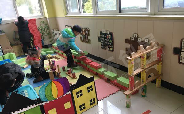 幼儿园建构区墙面图画不同建筑搭建方法图片