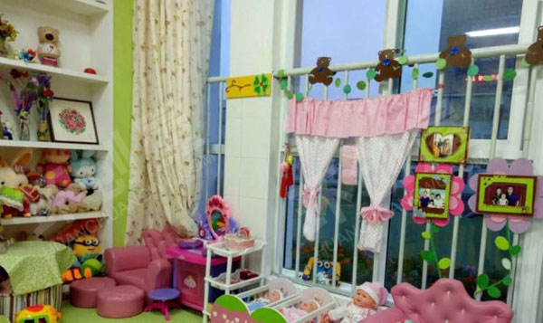 幼儿园角色游戏绿色系娃娃家图片