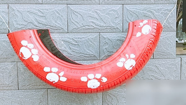 幼儿园废物利用轮胎户外卡通创意画图片