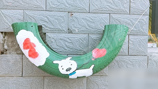 幼儿园废物利用轮胎户外卡通创意画图片