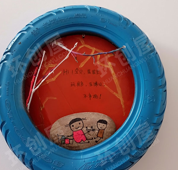 幼儿园墙面布置轮胎里的文明礼仪图片