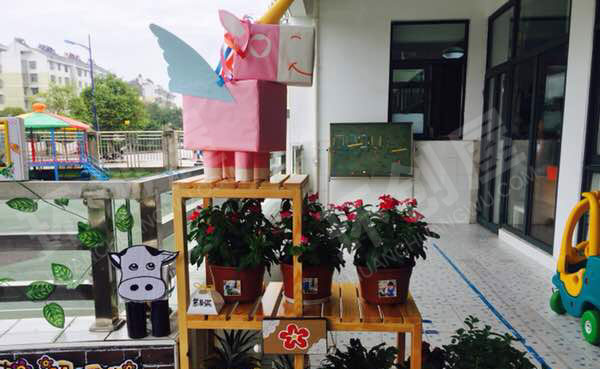 幼儿园户外废旧纸盒利用自然角图片