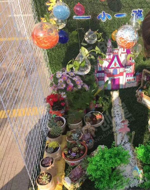 幼儿园户外环创跟着春意赏花图片