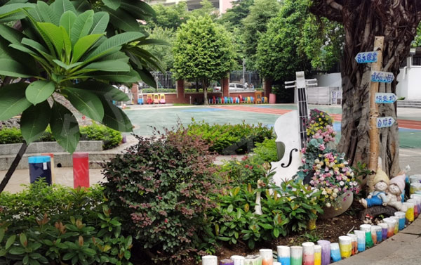幼儿园废物利用轮胎铁桶户外环境设计图片