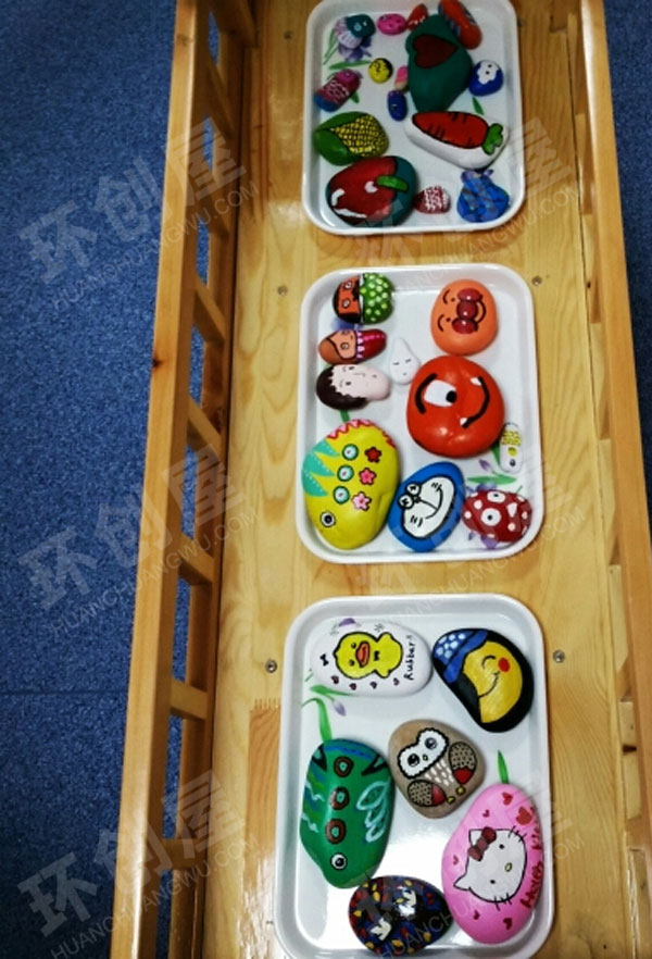幼儿园美工区环保石头画图片