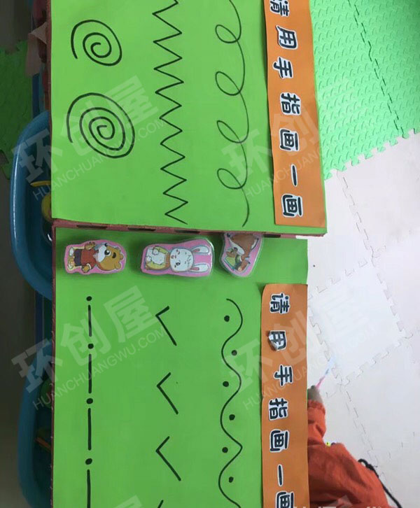 幼儿园益智区自制颜色鲜艳的玩教具图片 
