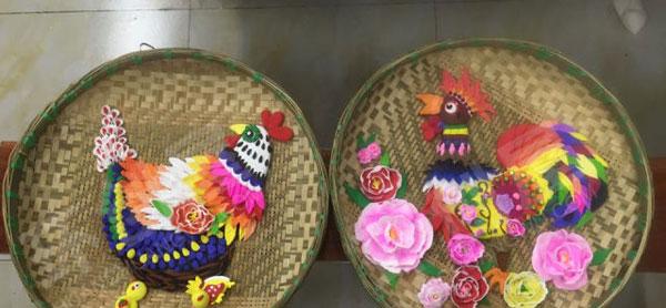 幼儿园作品展示新年作品簸箕装饰画图片