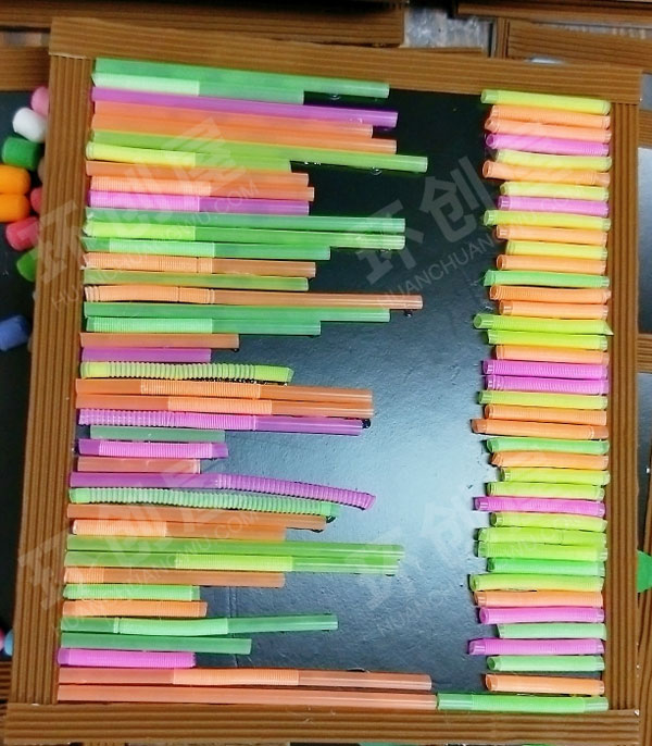 幼儿园墙面布置废物利用触摸墙图片