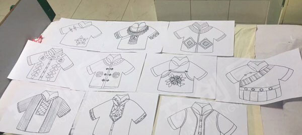 幼儿园走廊墙面各民族服饰纯手工绘制图片