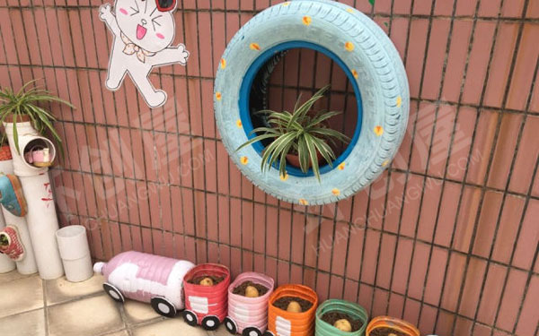 幼儿园户外墙面卡通植物角装饰图片