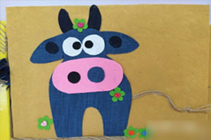 幼儿园废物利用布手工卡通动物挂饰图片9张