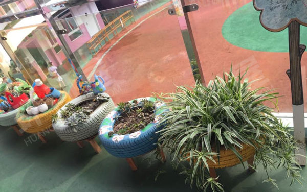 幼儿园户外废物利用种植区图片