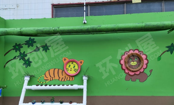幼儿园废物利用轮胎PV管户外墙面装饰图片