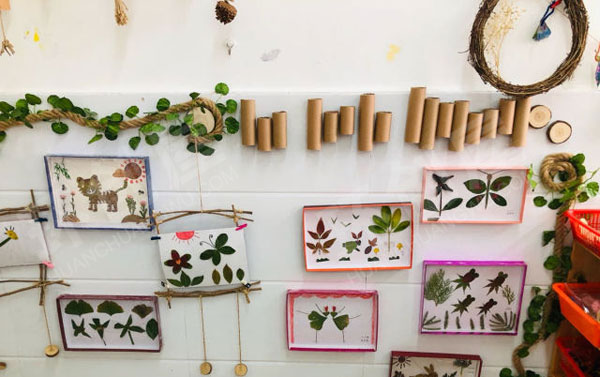 幼儿园树叶树枝美术墙面作品展示图片