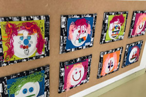 幼儿园废物利用纸盘卡通创意小人头作品展示图片7张