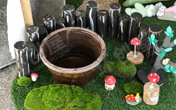 幼儿园户外一角春天主题布置图片