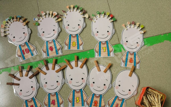 幼儿园益智区夹子当头发图片