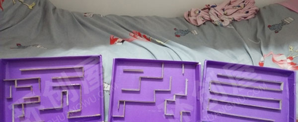 幼儿园益智区废物利用做迷宫图片