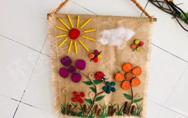 幼儿园石头贝壳麻布手工绘画作品墙面布置图片