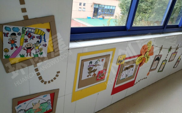 幼儿园走廊纸板风格的主题墙布置图片