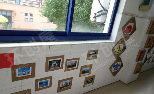 幼儿园走廊纸板风格的主题墙布置图片