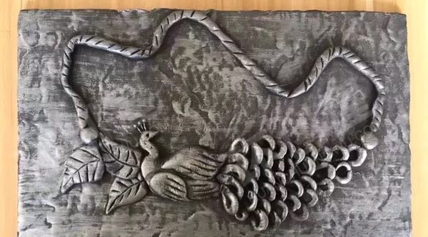 幼儿园粘土仿铜浮雕画作品展示图片