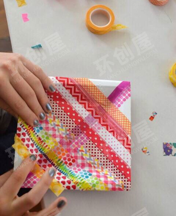 幼儿园美工区彩色胶带纸盘图片