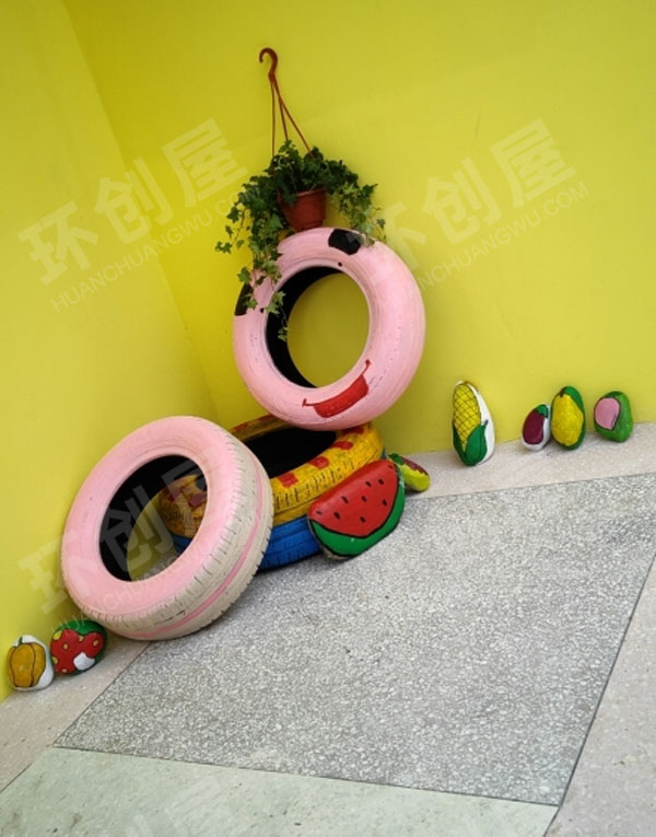 幼儿园户外废物利用轮胎大变身图片