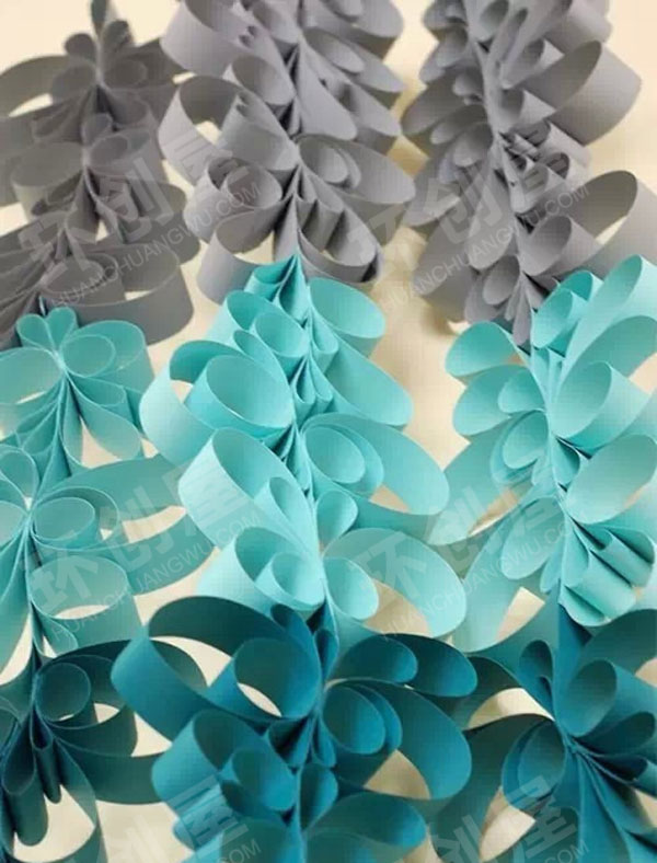 幼儿园纸卷制作立体感花朵吊饰图片