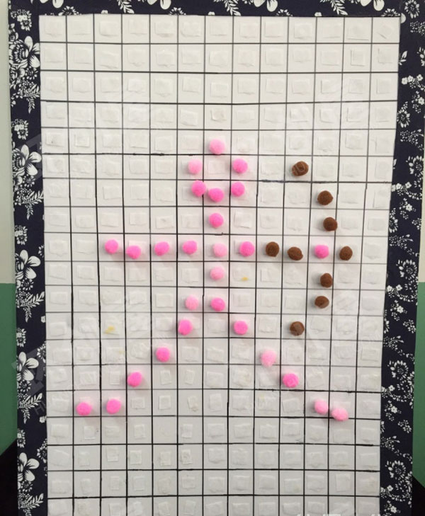 幼儿园益智区棋子的一物多玩图片