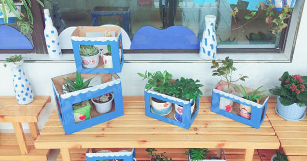 幼儿园蓝白世界走廊植物角图片
